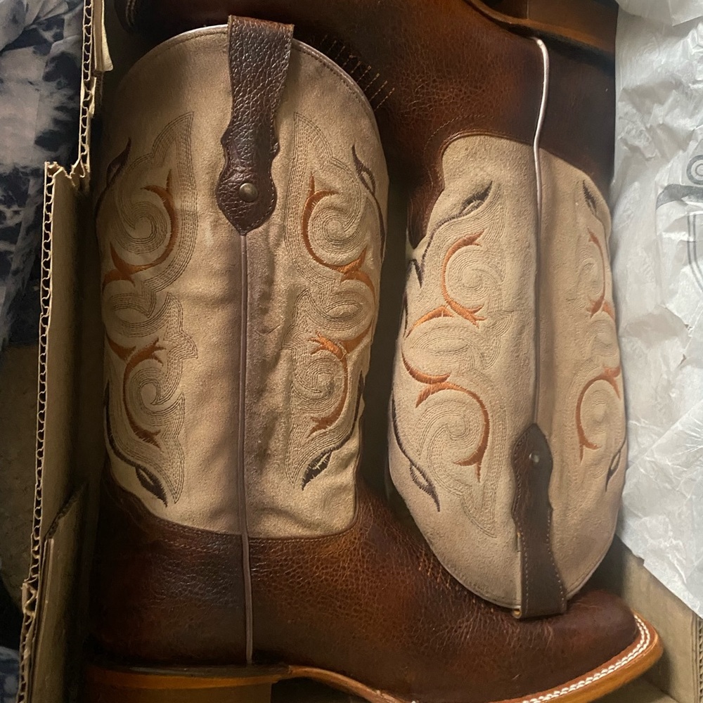 Two pairs of boots .$100 Each .